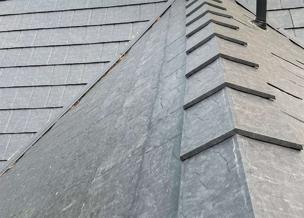 A new grey slate tile roof on a Kingston home installed by RD Building Services